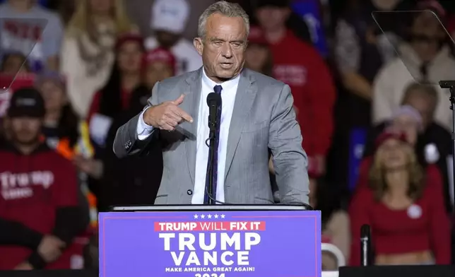 Robert F. Kennedy Jr., speaks before Republican presidential nominee former President Donald Trump at a campaign event Friday, Nov. 1, 2024, in Milwaukee. (AP Photo/Morry Gash)