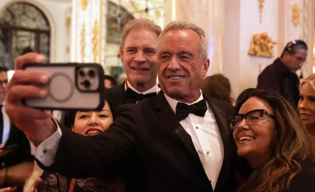 Robert F. Kennedy Jr. arrives before President-elect Donald Trump speaks during an America First Policy Institute gala at his Mar-a-Lago estate, Thursday, Nov. 14, 2024, in Palm Beach, Fla. (AP Photo/Alex Brandon)