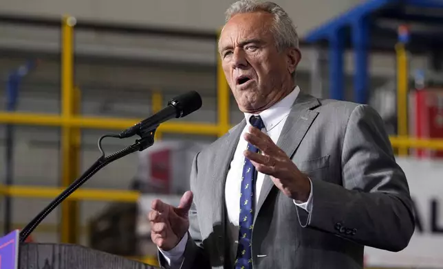 FILE - Robert F. Kennedy, Jr., speaks before Republican presidential nominee former President Donald Trump at a campaign event, Sept. 27, 2024 in Walker, Mich. (AP Photo/Carlos Osorio)