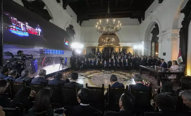 Peru's President Dina Boluarte and Chinese President Xi Jinping, both right, watch the inauguration of a Chinese-funded port in the city of Chancay, during a virtual ceremony at the government palace in Lima, Peru, Thursday, Nov. 14, 2024. (AP Photo/Fernando Vergara)