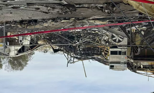 The area is closed off showing damage from an explosion at the Givaudan Color Sense plant in Louisville, Ky. on Wednesday, Nov. 13, 2024. (AP Photo/Dylan Lovan)