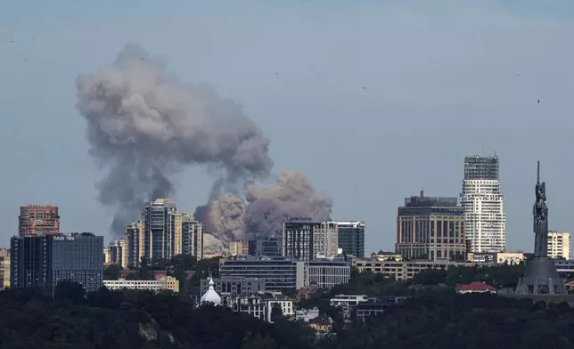 FILE - Smoke rises over the Kyiv skyline after a Russian attack, Monday, July 8, 2024. (AP Photo/ Evgeniy Maloletka, File)