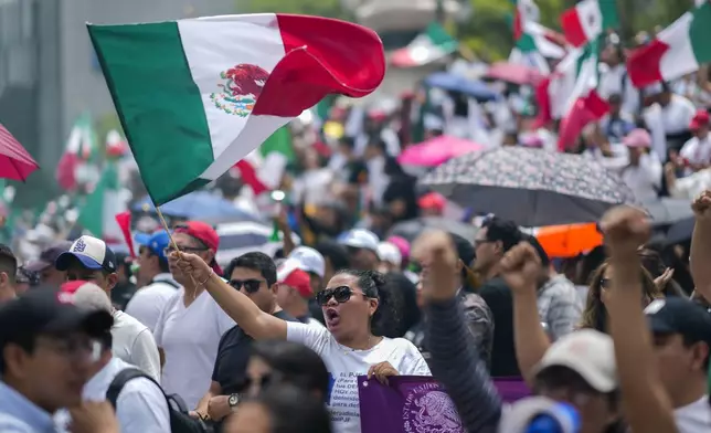 FILE - Judicial workers protest the government's judicial reform, which was approved in the Senate and would make judges stand for election, in Mexico City, Sept. 11, 2024. (AP Photo/Eduardo Verdugo, File)