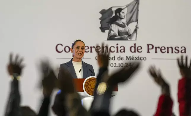 FILE - Mexican President Claudia Sheinbaum gives a media briefing at the National Palace in Mexico City, Oct. 2, 2024. (AP Photo/Fernando Llano, File)