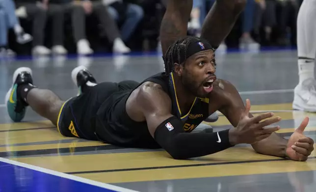 Golden State Warriors guard Buddy Hield reacts during the first half of an Emirates NBA Cup basketball game against the Memphis Grizzlies, Friday, Nov. 15, 2024, in San Francisco. (AP Photo/Godofredo A. Vásquez)