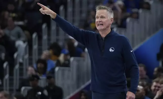 Golden State Warriors head coach Steve Kerr reacts during the first half of an Emirates NBA Cup basketball game against the Memphis Grizzlies, Friday, Nov. 15, 2024, in San Francisco. (AP Photo/Godofredo A. Vásquez)