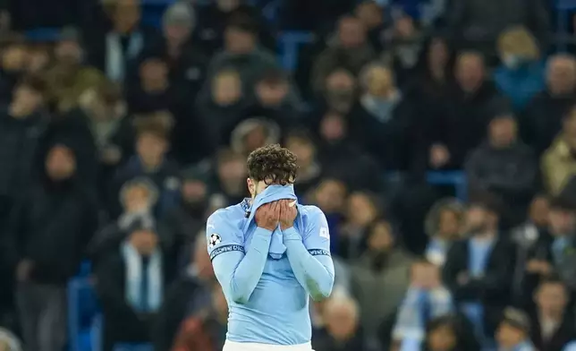 Manchester City's Josko Gvardiol reacts after Feyenoord's Santiago Gimenez scored a goal during the Champions League opening phase soccer match between Manchester City and Feyenoord at the Etihad Stadium in Manchester, England, Tuesday, Nov. 26, 2024. (AP Photo/Dave Thompson)