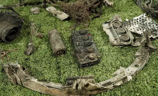 Fragments of a rocket which struck Dnipro on November 21 are seen at a center for forensic analysis in undisclosed location, Ukraine, Sunday Nov. 24, 2024. (AP Photo/Evgeniy Maloletka)