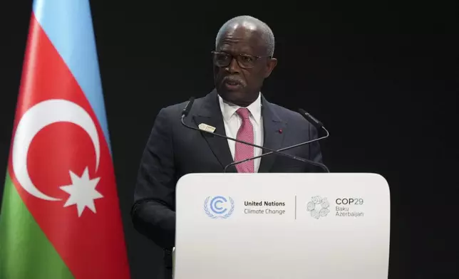 Gabon President Brice Clotaire Oligui Nguema speaks during a plenary session at the COP29 U.N. Climate Summit, Wednesday, Nov. 13, 2024, in Baku, Azerbaijan. (AP Photo/Sergei Grits)