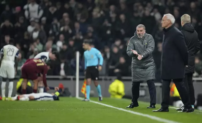 Tottenham's head coach Ange Postecoglou gives directions to his players during the Europa League opening phase soccer match between Tottenham Hotspur and Roma at the Tottenham Hotspur Stadium in London, Thursday, Nov. 28, 2024. (AP Photo/Kin Cheung)