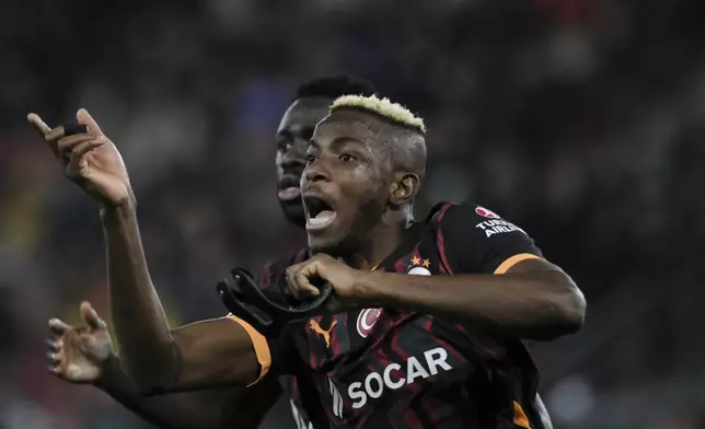 Galatasaray's Victor Osimhen gestures during the Europa League soccer match between Alkmaar and Galatasaray at AFAS stadium in Alkmaar, Netherlands, Thursday, Nov. 28, 2024. (AP Photo/Patrick Post)