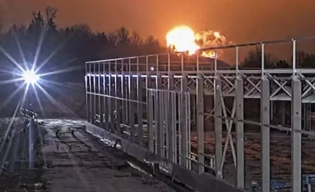 In this photo taken from video, made available on Monday, Nov. 25, 2024, a DHL cargo plane chrashes near Vilnius, Lithuania (Teltonika company via AP)