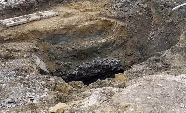The sinkhole, where the remains of Elizabeth Pollard was found Friday, Dec. 6, 2024 is shown in Marguerite, Pa. (AP Photo/Matt Freed)