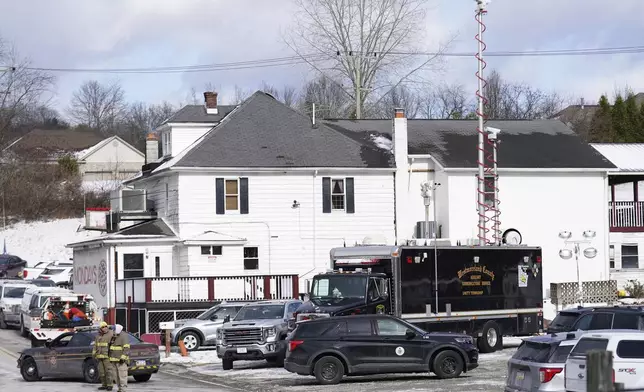 The scene, Friday, Dec. 6, 2024, where Elizabeth Pollard is believed to have disappeared in a sinkhole while looking for her cat, in Marguerite, Pa. (AP Photo/Matt Freed)