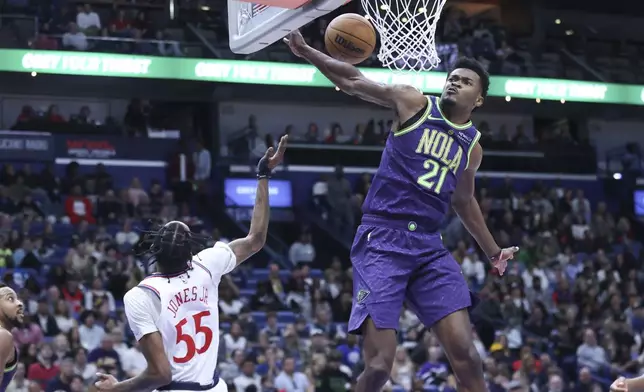 New Orleans Pelicans center Yves Missi (21) blocks Los Angeles Clippers forward Derrick Jones Jr. (55) shot in the first half of an NBA basketball game in New Orleans, Monday, Dec. 30, 2024. (AP Photo/Peter Forest)