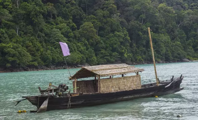 A Kabang boat is docked on Surin Islands, Phang Nga Province, Thailand, Thursday, Dec. 12, 2024. (AP Photo/Sakchai Lalit)