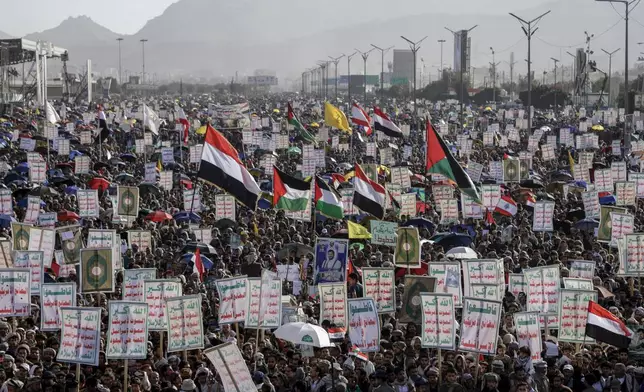 Houthi supporters attend an anti-Israel rally in Sanaa, Yemen, Friday, Dec. 27, 2024. (AP Photo/Osamah Abdulrahman)