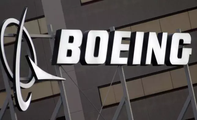 FILE - In this Jan. 25, 2011, file photo, is the Boeing Company logo on the property in El Segundo, Calif. (AP Photo/Reed Saxon, File)