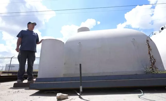 Ron Hubbard, owner of Atlas Survival Shelters, talks about concrete bunkers during a tour of his operations in Sulphur Springs, Texas, Tuesday, Aug. 27, 2024, (AP Photo/LM Otero)