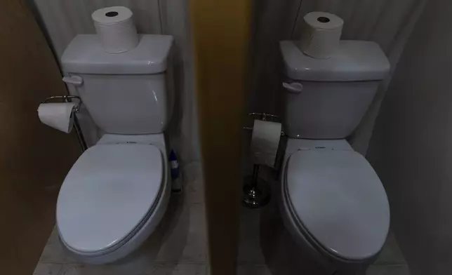 Two toilets are seen inside an underground shelter in an undisclosed Southern California city, on Dec. 16, 2024. (AP Photo/Jae C. Hong)