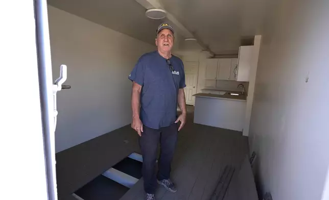 Ron Hubbard, owner of Atlas Survival Shelters, stands in a bunker his company is building for a client on Aug. 27, 2024, in Sulphur Springs, Texas. (AP Photo/LM Otero)