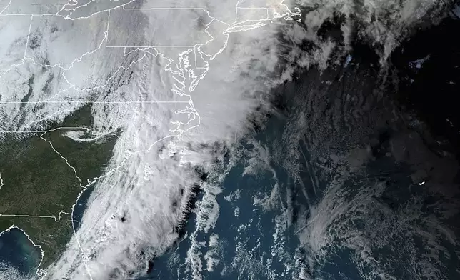 This Dec. 11. 2024 image provided by the National Oceanic and Atmospheric Administration (NOAA), shows a storm passing through the U.S. Atlantic east coast. (NOAA via AP)