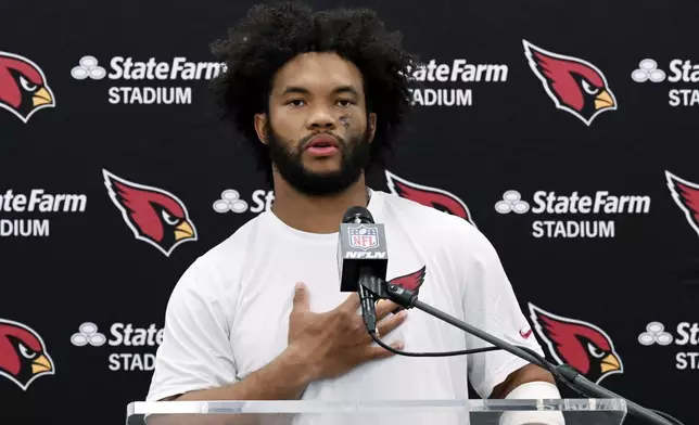 Arizona Cardinals quarterback Kyler Murray answers questions after an NFL football game against the Los Angeles Rams, Saturday, Dec. 28, 2024, in Inglewood, Calif. (AP Photo/Alex Gallardo)