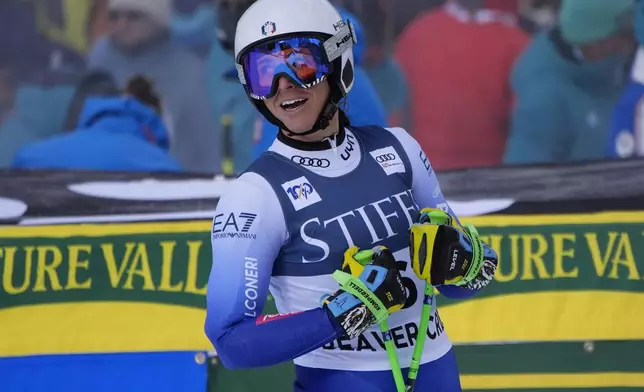 Italy's Elena Curtoni reacts after finishing a women's World Cup super-G ski race, Sunday, Dec. 15, 2024, in Beaver Creek, Colo. (AP Photo/John Locher)