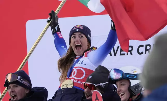 Italy's Sofia Goggia celebrates her victory in a World Cup women's Super-G ski race, Sunday, Dec. 15, 2024, in Beaver Creek, Colo. (AP Photo/Robert F. Bukaty)