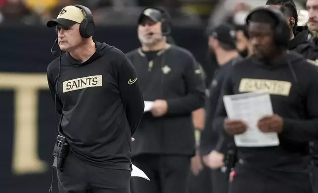 New Orleans Saints interim head coach Darren Rizzi watches from the sideline during the first half of an NFL football game against the Los Angeles Rams, Sunday, Dec. 1, 2024, in New Orleans. (AP Photo/Gerald Herbert)