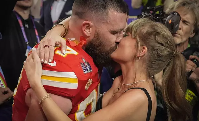 Kansas City Chiefs tight end Travis Kelce kisses Taylor Swift after the NFL Super Bowl 58 football game against the San Francisco 49ers on Feb. 11, 2024, in Las Vegas. The Chiefs won 25-22. (AP Photo/John Locher)