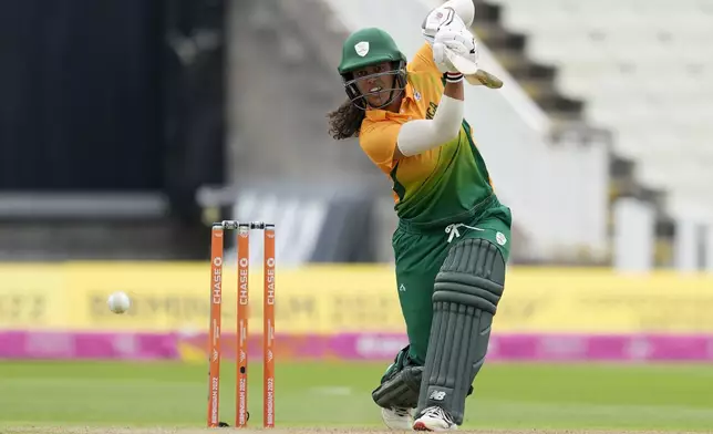 FILE - South Africa's Laura Wolvaardt plays a shot during the women's cricket T20 preliminary round match between New Zealand and South Africa at the Commonwealth Games in Birmingham, England, Saturday, July 30, 2022. (AP Photo/Aijaz Rahi, File)