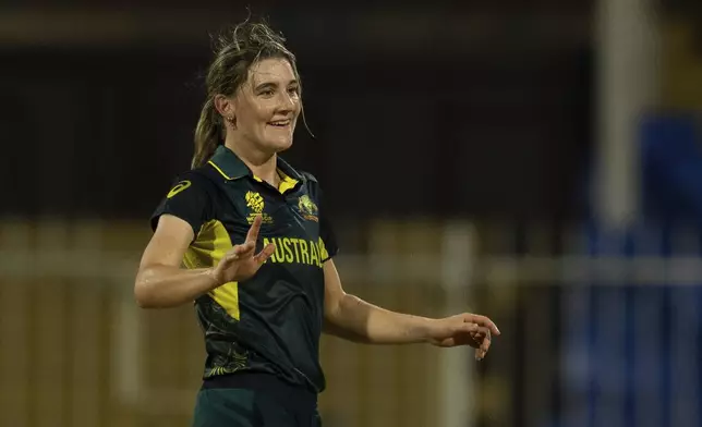 FILE - Australia's Annabel Sutherland celebrate the wicket of New Zealand's Isabella Gaze during the ICC Women's T20 World Cup 2024 match between Australia and New Zealand at Sharjah Stadium, United Arab Emirates, Tuesday, Oct. 8, 2024. (AP Photo/Altaf Qadri, File)