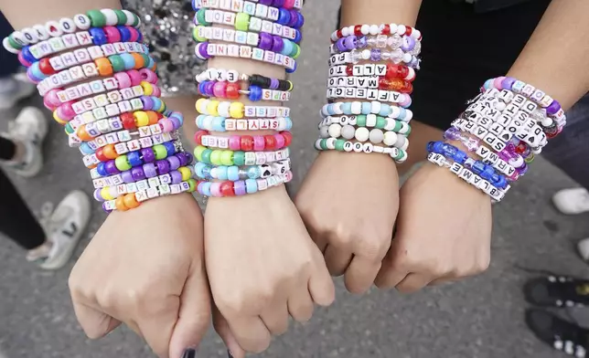 FILE - Taylor Swift fans display bracelets outside Toronto's Rogers Centre before going to see Taylor Swift perform on Nov. 14, 2024. (Chris Young/The Canadian Press via AP, File)