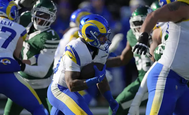 Los Angeles Rams running back Kyren Williams runs against the New York Jets during the first half of an NFL football game in East Rutherford, N.J., Sunday, Dec. 22, 2024. (AP Photo/Seth Wenig)