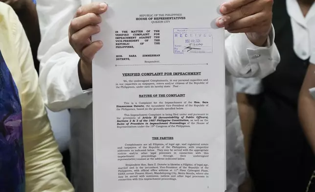 A received copy of an impeachment complaint filed Monday, Dec. 2, 2024 against Philippine Vice President Sara Duterte by several prominent opponents and activists at the House of Representatives in Quezon City, Philippines. (AP Photo/Aaron Favila)