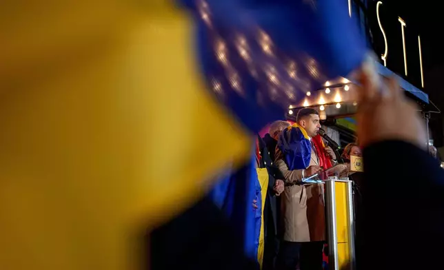 George Simion, leader of the Alliance for the Unity of Romanians (AUR) speaks to media after polls closed during the country's parliamentary elections, in Bucharest, Romania, Sunday, Dec. 1, 2024. (AP Photo/Andreea Alexandru)