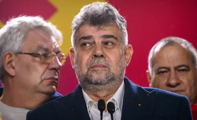 Romanian Prime Minister Marcel Ciolacu, of the Social Democratic Party or PSD, speaks after exit polls in the country's parliamentary elections, in Bucharest, Romania, Sunday, Dec. 1, 2024. (AP Photo/Alexandru Dobre)