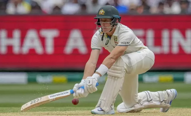 Australia's Marnus Labuschagne plays a reverse sweep during play on the first day of the fourth cricket test between Australia and India at the Melbourne Cricket Ground, Melbourne, Australia, Thursday, Dec. 26, 2024. (AP Photo/Asanka Brendon Ratnayake)