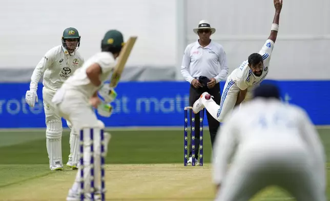 India's Jasprit Bumrah bowls to Australia's Sam Konstas during play on the first day of the fourth cricket test between Australia and India at the Melbourne Cricket Ground, Melbourne, Australia, Thursday, Dec. 26, 2024. (AP Photo/Asanka Brendon Ratnayake)