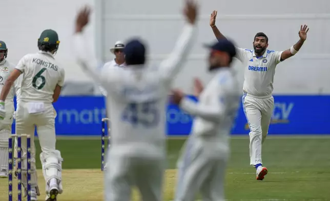 India's Jasprit Bumrah, right, reacts after bowling to Australia's Sam Konstas, left, during play on the first day of the fourth cricket test between Australia and India at the Melbourne Cricket Ground, Melbourne, Australia, Thursday, Dec. 26, 2024. (AP Photo/Asanka Brendon Ratnayake)