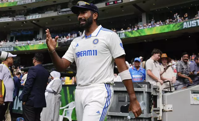 India's Jasprit Bumrah walks out onto the field ahead of play on the first day of the fourth cricket test between Australia and India at the Melbourne Cricket Ground, Melbourne, Australia, Thursday, Dec. 26, 2024. (AP Photo/Asanka Brendon Ratnayake)