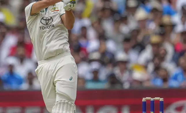 Australia's Sam Konstas plays a shot during play on the first day of the fourth cricket test between Australia and India at the Melbourne Cricket Ground, Melbourne, Australia, Thursday, Dec. 26, 2024. (AP Photo/Asanka Brendon Ratnayake)