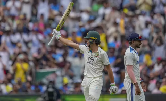 Australia's Sam Konstas bats celebrates his fifty runs during play on the first day of the fourth cricket test between Australia and India at the Melbourne Cricket Ground, Melbourne, Australia, Thursday, Dec. 26, 2024. (AP Photo/Asanka Brendon Ratnayake)