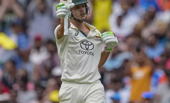 Australia's Sam Konstas bats celebrates his fifty runs during play on the first day of the fourth cricket test between Australia and India at the Melbourne Cricket Ground, Melbourne, Australia, Thursday, Dec. 26, 2024. (AP Photo/Asanka Brendon Ratnayake)