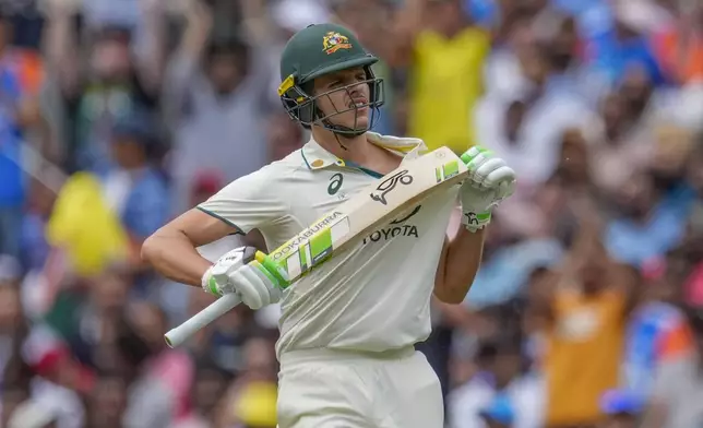 Australia's Sam Konstas bats celebrates his fifty runs during play on the first day of the fourth cricket test between Australia and India at the Melbourne Cricket Ground, Melbourne, Australia, Thursday, Dec. 26, 2024. (AP Photo/Asanka Brendon Ratnayake)