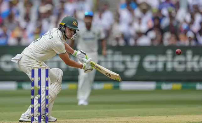 Australia's Sam Konstas watches the ball after playing shot during play on the first day of the fourth cricket test between Australia and India at the Melbourne Cricket Ground, Melbourne, Australia, Thursday, Dec. 26, 2024. (AP Photo/Asanka Brendon Ratnayake)