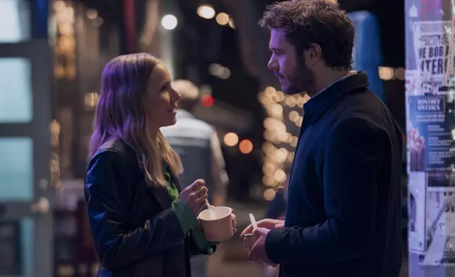 This image released by Netflix shows Kristen Bell, left, and Adam Brody in a scene from "Nobody Wants This." (Stefania Rosini/Netflix via AP)