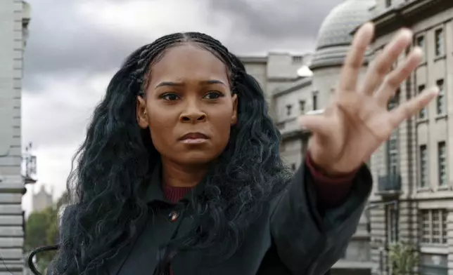 This image released by Netflix shows Nadine Mills in a scene from "Supacell." (Netflix via AP)