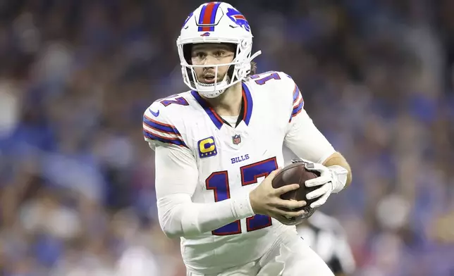 Buffalo Bills quarterback Josh Allen (17) runs against the Detroit Lions during the second half of an NFL football game, Sunday, Dec. 15, 2024, in Detroit. (AP Photo/Rey Del Rio)